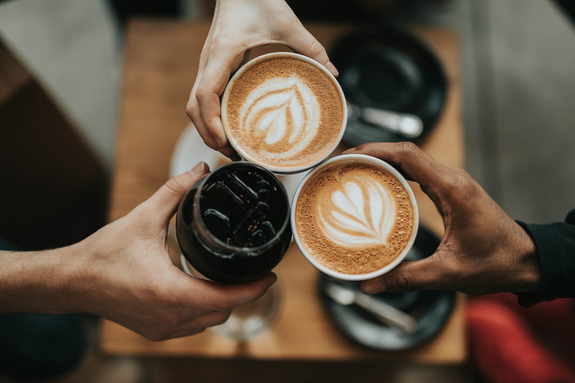Fresh coffee being poured at a vendor cart